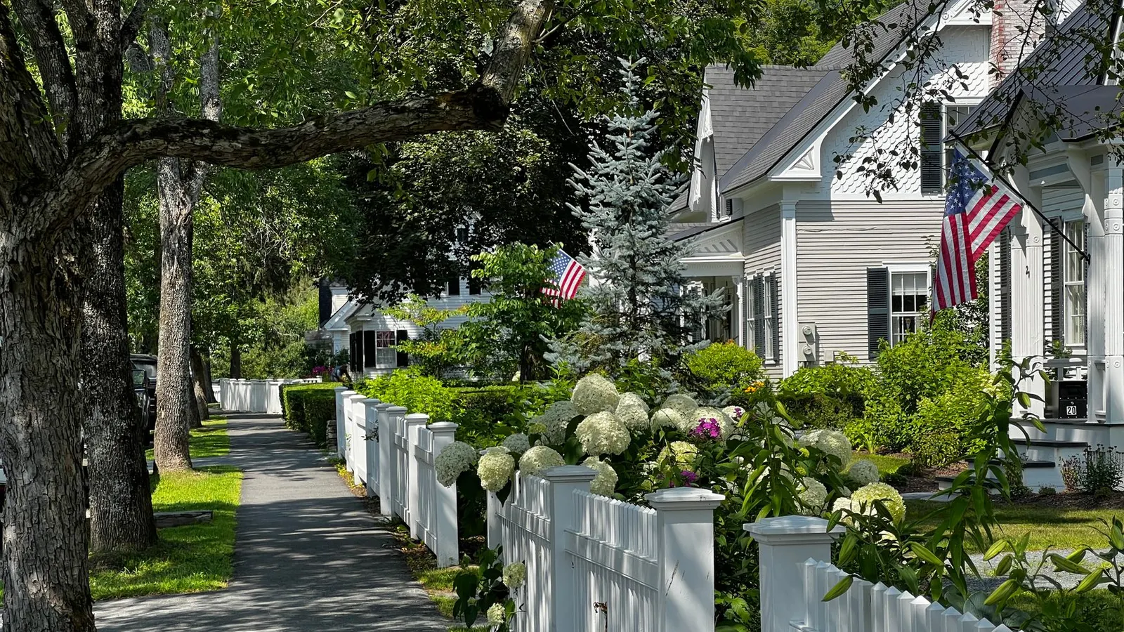 General contractor in Peabody, MA, a New England street with white houses and picket fences